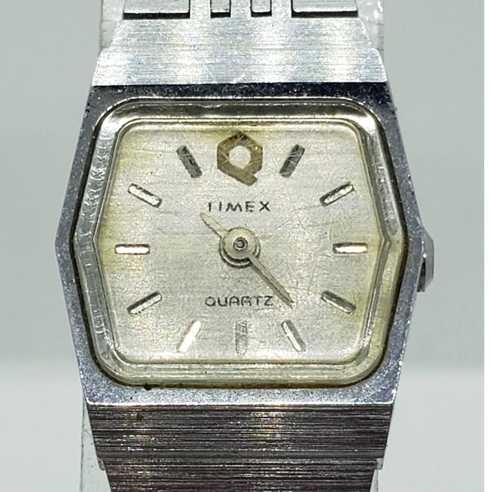 Timex women's dress watch. Small hexagon light gold iridescent face